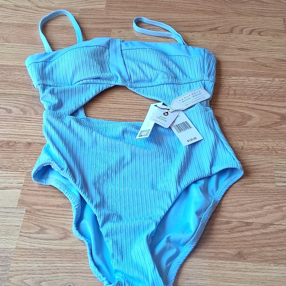 NWT ladies one piece cut out style swimsuit  Light blue by Sanctuary MSRP $125